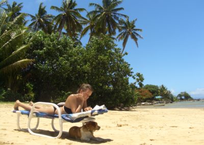 Relaxing on the beach at Coconut Grove Beachfront Cottages, Fiji